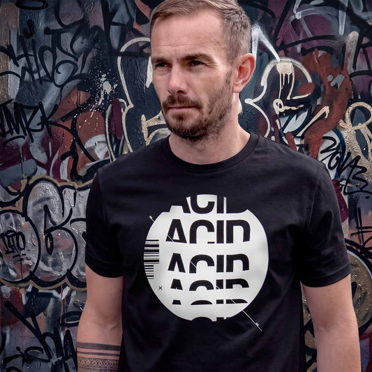 Man wearing a black acid house t-shirt with white ACID DROP screen print
