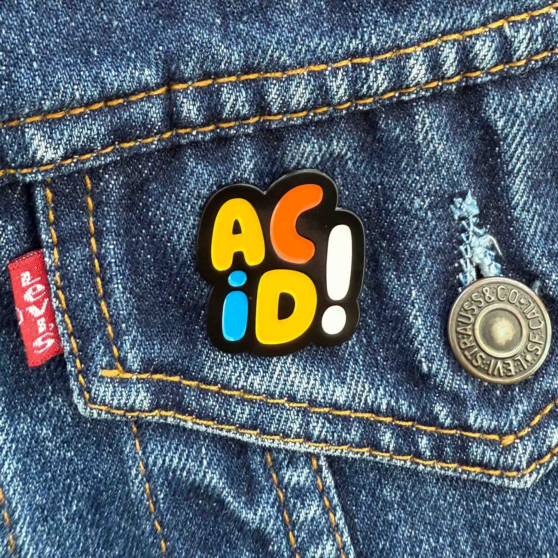 Multi-Colour Acid House Pin Badge on pocket