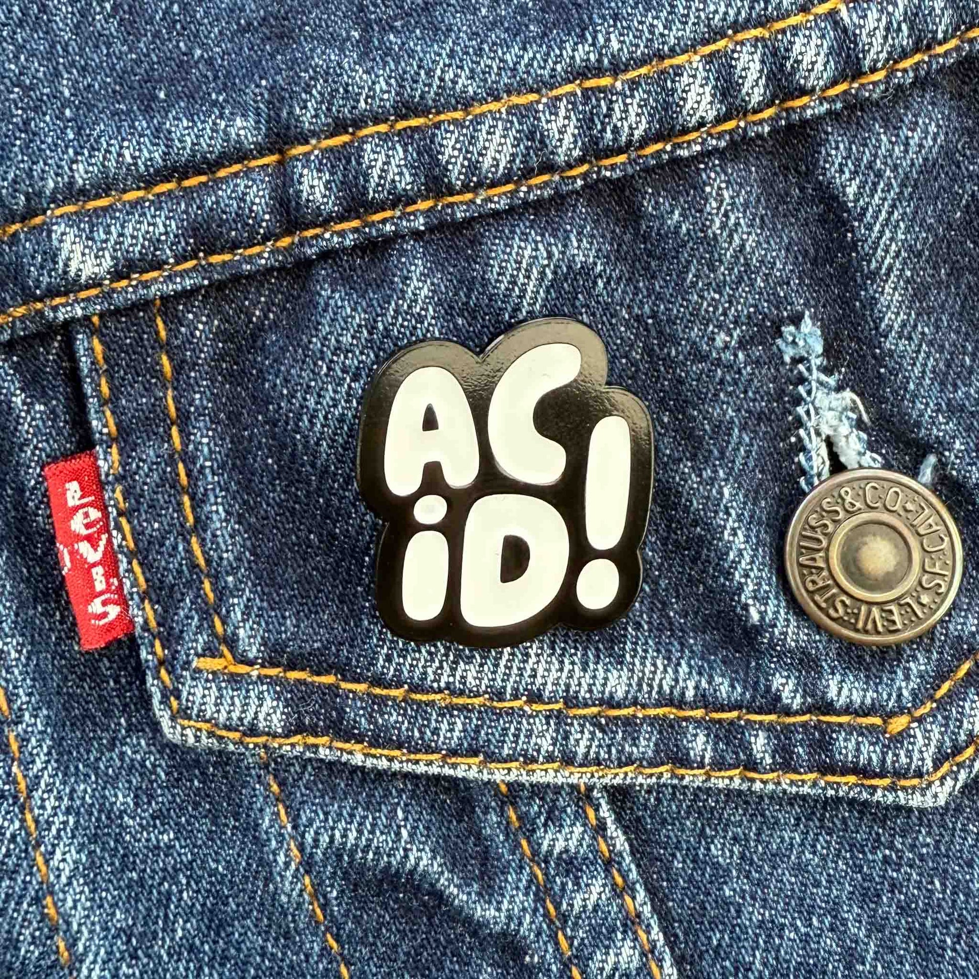 White Acid House Pin Badge on pocket