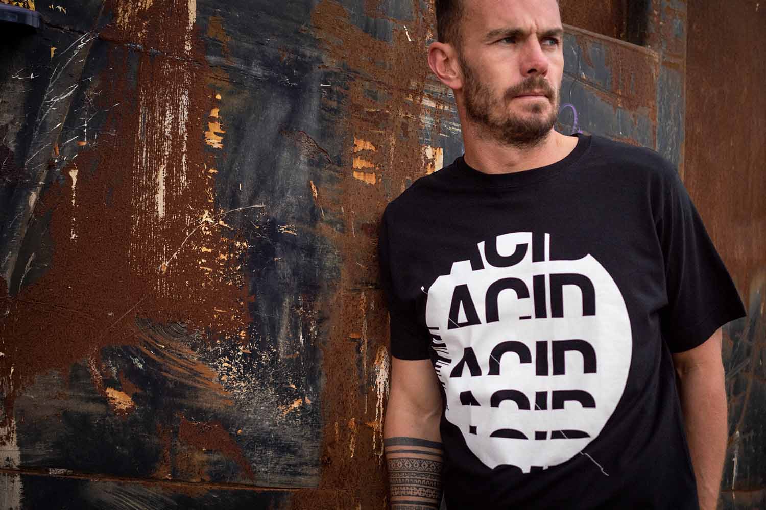 Man wearing a Subhustle house music t-shirt — small-batch screen-printed design from an independent UK studio
