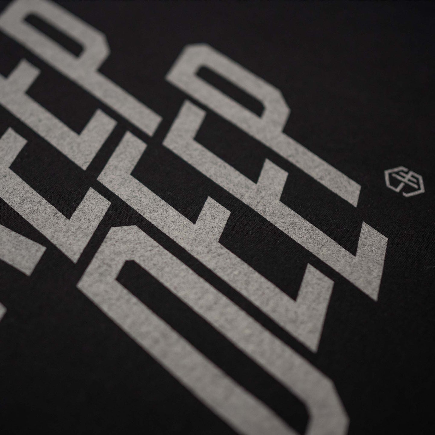 Keep Deep Black T-shirt detail of Silver Grey Typographic Design