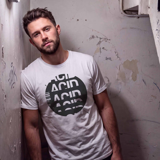 Man wearing white acid house t-shirt with grey graphite design in a club basement