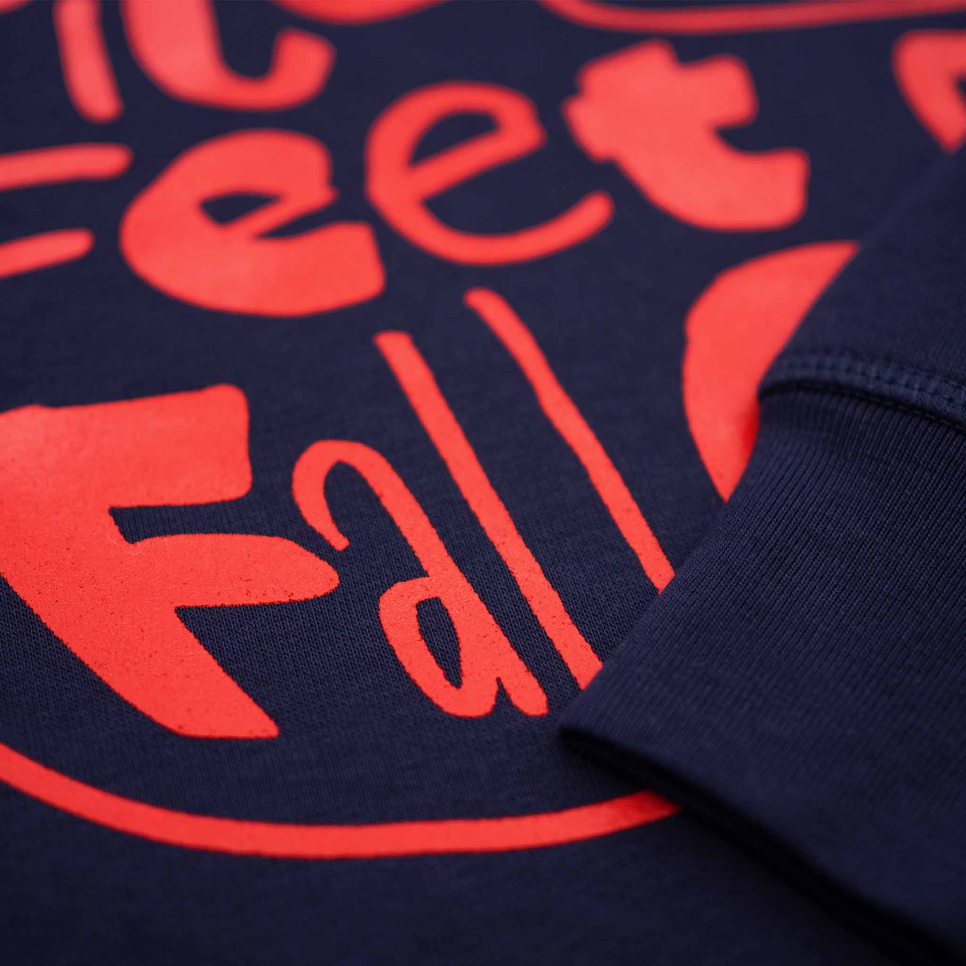 Dance 'til ur feet fall off navy sweatshirt with red graphic type design